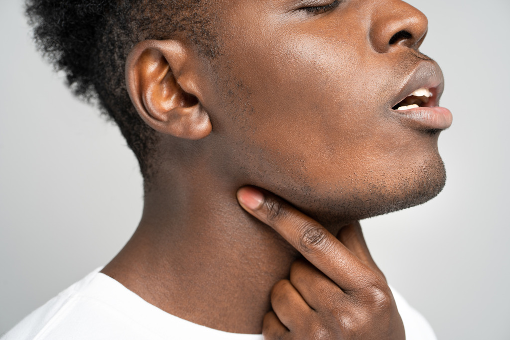 Picture of an African American Man Discovering the Answer to Can Allergies Make You Hoarse